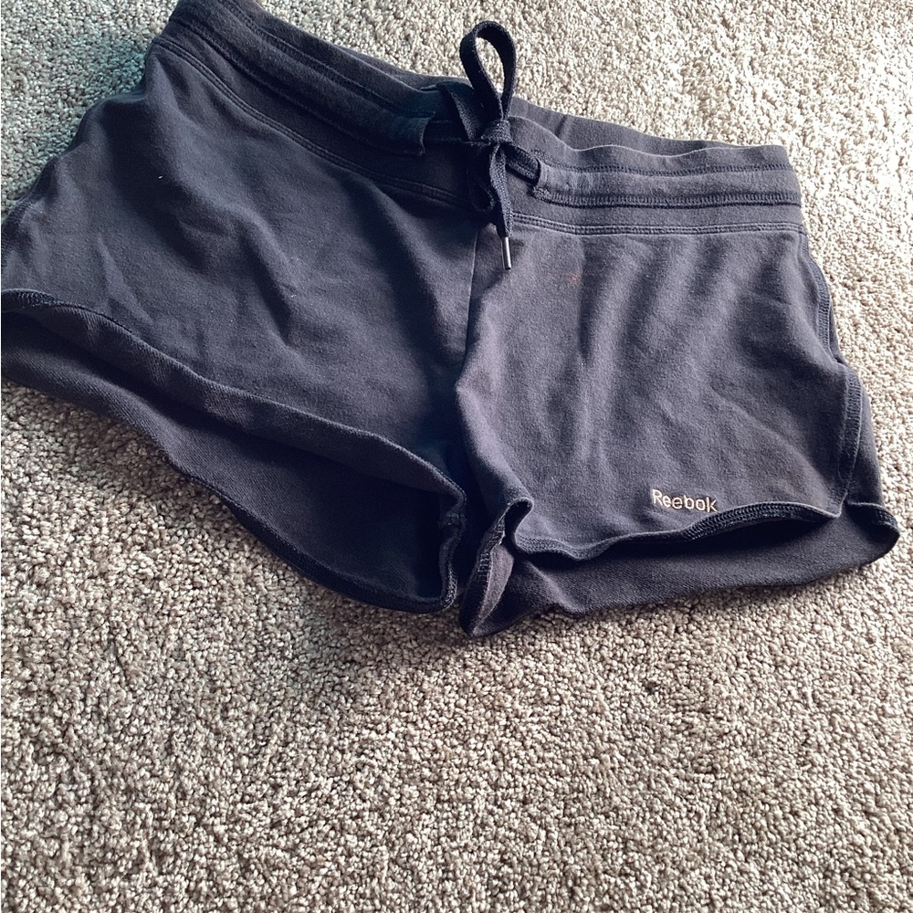 Reebok black shorts.